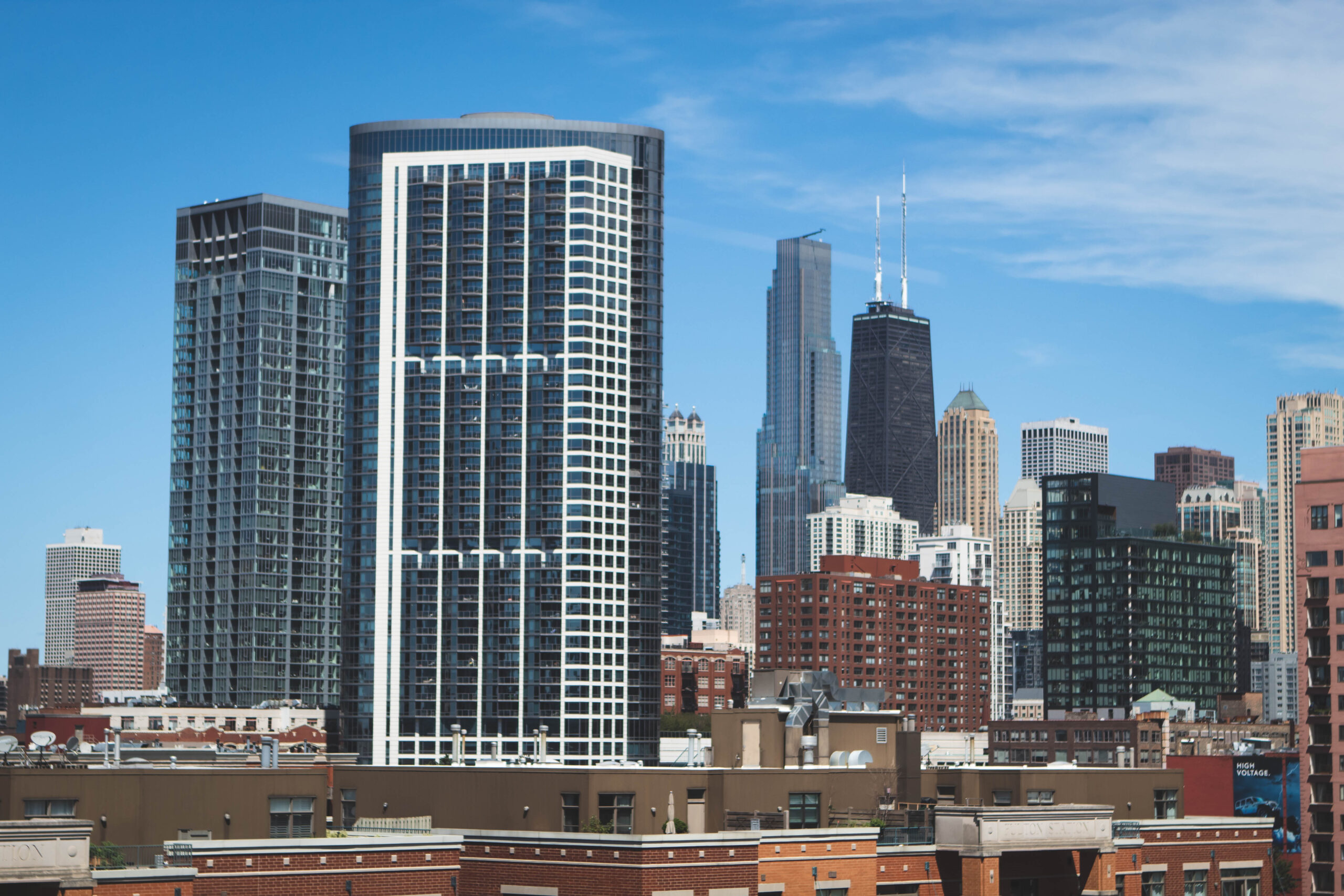 View of Chicago skyline from the ELITE Transit Solutions office, the notable Hancock Building pears above other buildings.